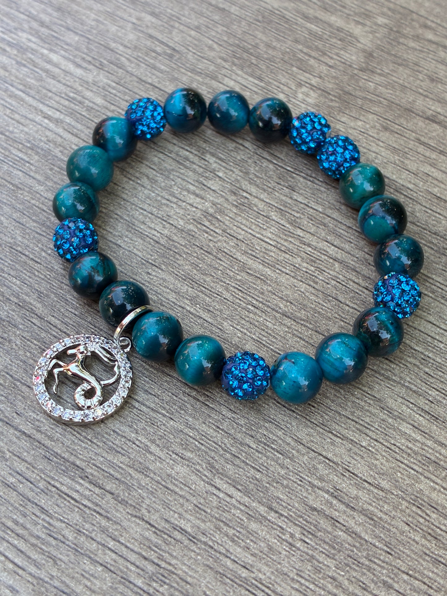 Blue Tiger's Eye Beaded Bracelet featuring Silver Capricorn Charm- Size Medium