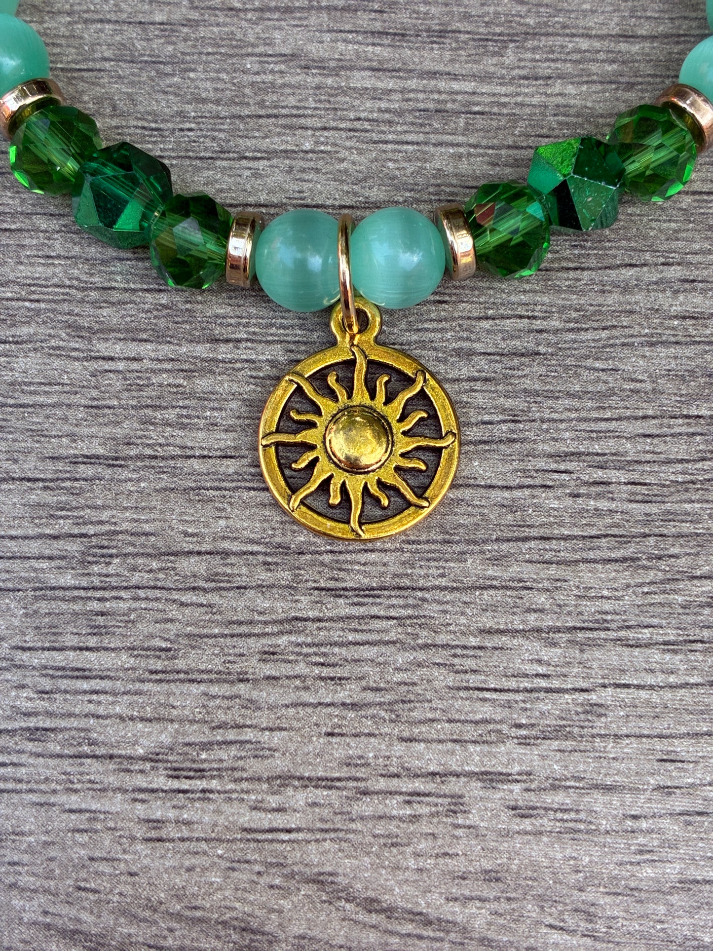 Green Cat's Eye Beaded Bracelet featuring Gold Sun Dial Charm- Size Large