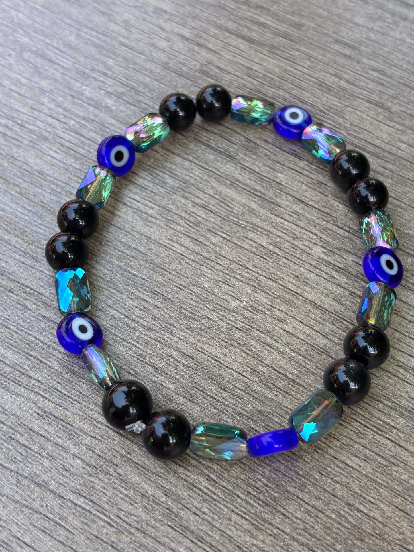 Obsidian & Metallic Blue Beaded Bracelet featuring an Evil Eye bead- Size Large
