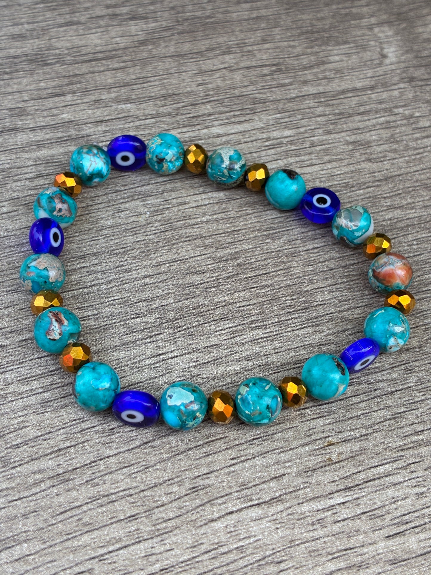 Blue Serpentine Beaded Crystal Bracelet featuring Evil Eye Bead- Size Large