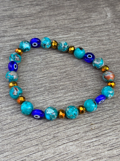 Blue Serpentine Beaded Crystal Bracelet featuring Evil Eye Bead- Size Large