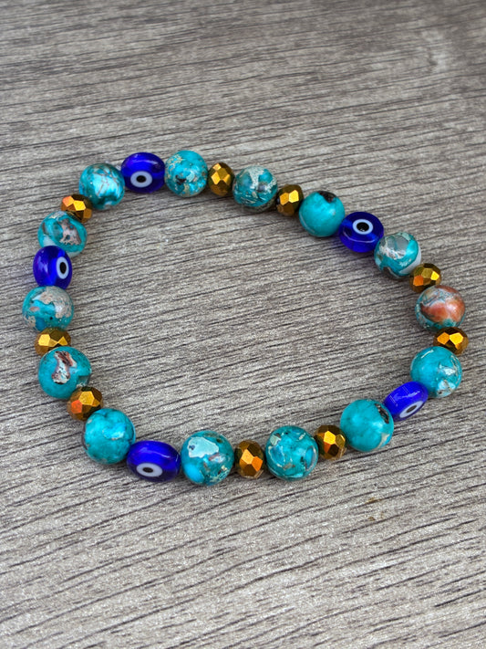 Blue Serpentine Beaded Crystal Bracelet featuring Evil Eye Bead- Size Large