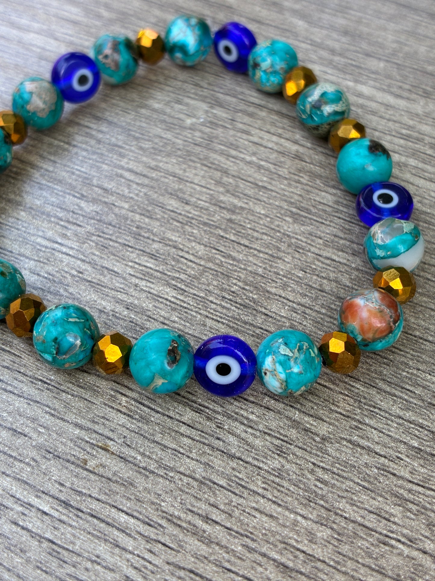 Blue Serpentine Beaded Crystal Bracelet featuring Evil Eye Bead- Size Large
