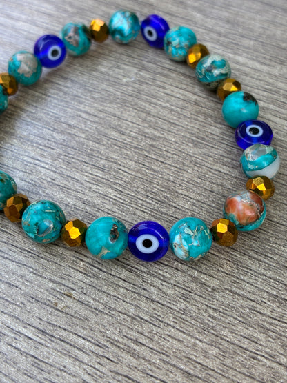 Blue Serpentine Beaded Crystal Bracelet featuring Evil Eye Bead- Size Large